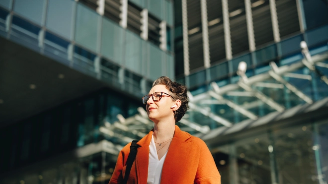 mature-businesswoman-listening-to-music